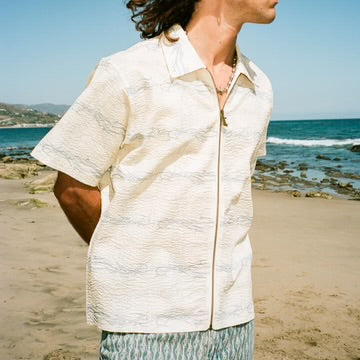 PLAYERA CON CREMALLERA CON CABLE CRUZADO (BLANCA)